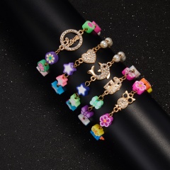 Colored butterfly elephant rhinestone soft pottery bracelet (circumference: 15+5cm/material: alloy + rhinestone + soft pottery) Butterfly elephant
